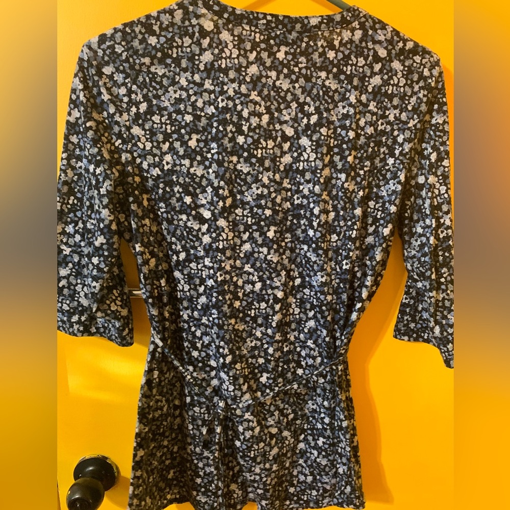 Reitmans blouse with buttons up front and tied just under breast. Size M